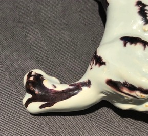 A polychrome Dutch Delft butter tub with a dog, 18th C.