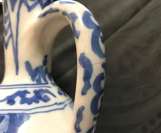 A Dutch Delft blue and white chinoiserie jug, 2nd halft 17th C.