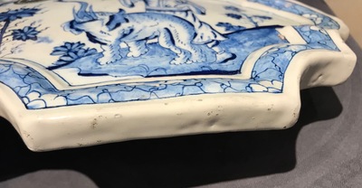 A Dutch Delft blue and white chinoiserie plaque with an elephant, 18th C.