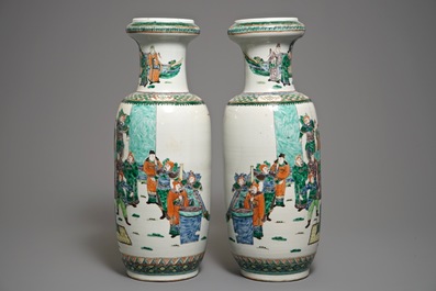 A pair of large Chinese famille verte figural rouleau vases, 19th C.