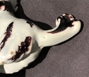 A polychrome Dutch Delft butter tub with a dog, 18th C.