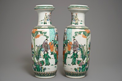 A pair of large Chinese famille verte figural rouleau vases, 19th C.