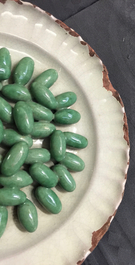 A French faience trompe l'oeil dish with olives, Moustiers, 18th C.