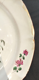 A French faience de l'Est plate with a bear, Les Islettes or Moustiers, 18th C.