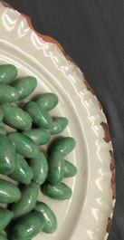 A French faience trompe l'oeil dish with olives, Moustiers, 18th C.