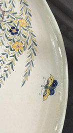 A polychrome French faience chinoiserie dish, Sinceny, 18th C.