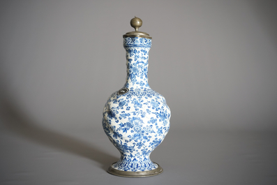 An attractive Dutch Delft blue and white gadrooned pewter-mounted jug, 2nd half 17th C.