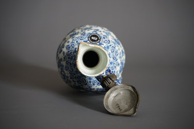 An attractive Dutch Delft blue and white gadrooned pewter-mounted jug, 2nd half 17th C.