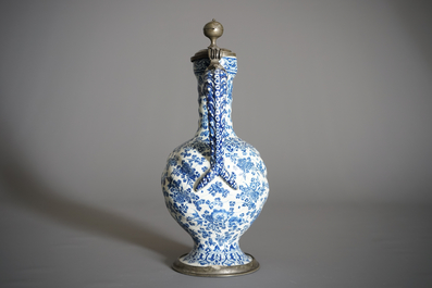An attractive Dutch Delft blue and white gadrooned pewter-mounted jug, 2nd half 17th C.