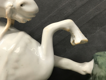 A pair of white Dutch Delft circus horses on a green base, 18th C.