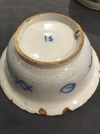 A Dutch Delft blue and white chinoiserie bowl and a polychrome Braunschweig mug, 1st half 18th C.
