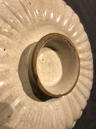 An Italian maiolica crespina with a saint, Deruta, 17th C.