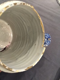 A Dutch Delft blue and white chinoiserie bowl and a polychrome Braunschweig mug, 1st half 18th C.
