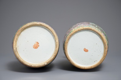 A pair of Chinese pink ground Canton vases, 19th C.