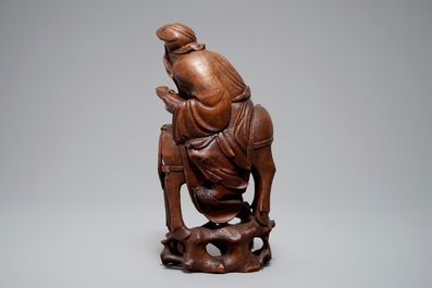 A large Chinese bamboo figure of a sage on horseback, Qing
