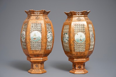 A pair of Chinese famille rose coral-ground lanterns, 19/20th C.