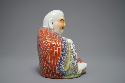 A large Chinese famille rose figure of Buddha, 19/20th C.