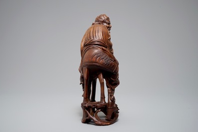 A large Chinese bamboo figure of a sage on horseback, Qing