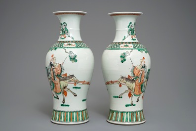 A pair of Chinese famille verte warrior vases, 19/20th C.