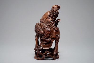 A large Chinese bamboo figure of a sage on horseback, Qing