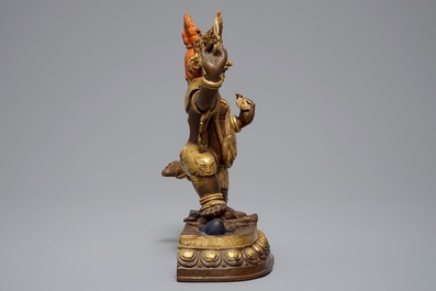 A Sino-Tibetan gilt bronze figure of Mahakala, 19th C.