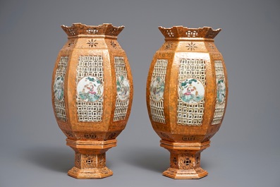 A pair of Chinese famille rose coral-ground lanterns, 19/20th C.