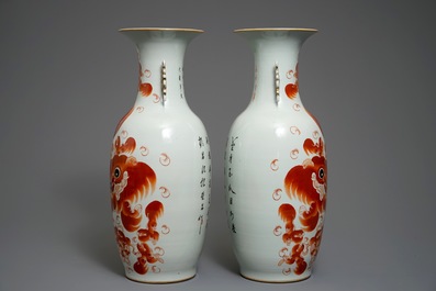 A pair of large Chinese iron red vases with Buddhist lions, 19/20th C.