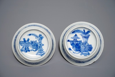 A pair of round Chinese blue and white salts with antiquities design, Kangxi