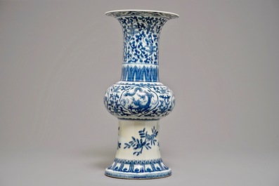 A large Chinese blue and white gu dragon vase, Qianlong mark, 19th C.