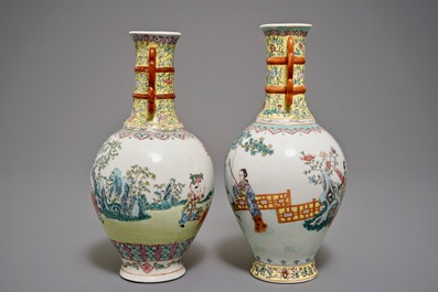Two Chinese famille rose bottle vases, Qianlong mark, 20th C.