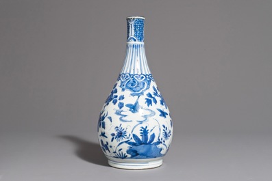 A fine Chinese blue and white bottle vase with a phoenix, hare mark, Wanli