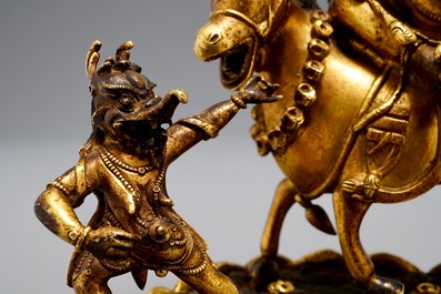 A Sino-Tibetan gilt bronze group of Palden Lhamo, 19/20th C.