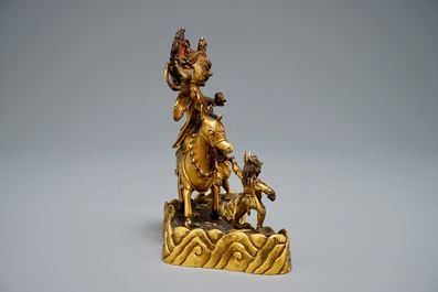 A Sino-Tibetan gilt bronze group of Palden Lhamo, 19/20th C.