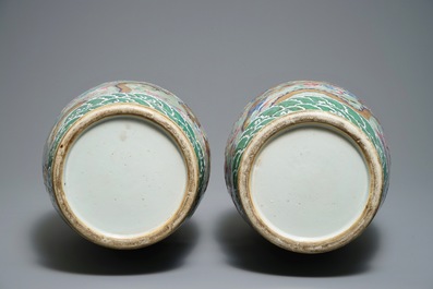 A pair of Chinese famille rose celadon-ground dragon vases, 19th C.