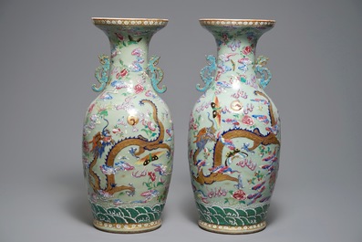 A pair of Chinese famille rose celadon-ground dragon vases, 19th C.