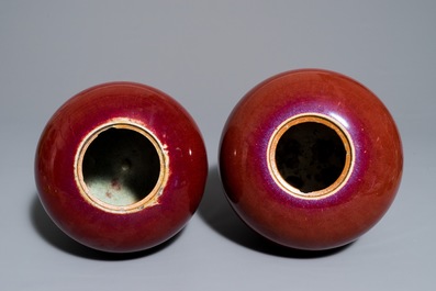 A pair of Chinese monochrome oxblood-glazed ginger jars and covers, 19th C.