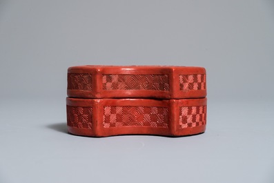 A Chinese cinnabar lacquer ingot-shaped box and cover, 18/19th C.