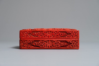 A rectangular Chinese cinnabar lacquer box and cover with dragons, 19th C.