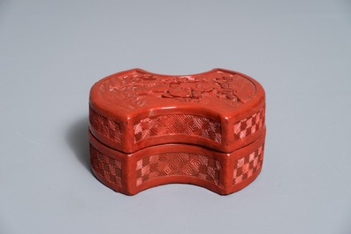 A Chinese cinnabar lacquer ingot-shaped box and cover, 18/19th C.