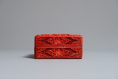 A rectangular Chinese cinnabar lacquer box and cover with dragons, 19th C.