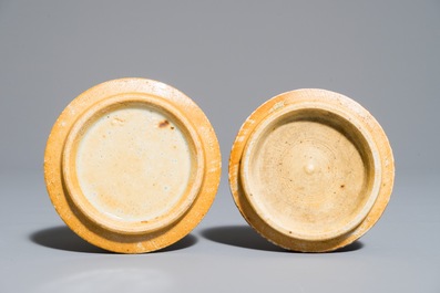 A pair of Chinese monochrome oxblood-glazed ginger jars and covers, 19th C.
