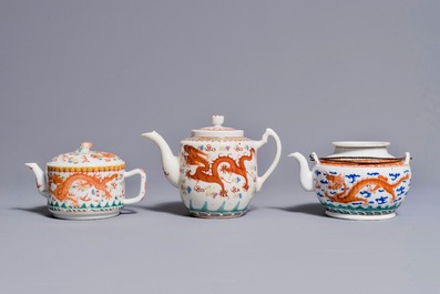 Three Chinese teapots and covers with dragon designs, 19/20th C.