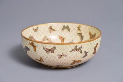 A Japanese Satsuma bowl with netted butterflies, Meiji, 19th C.