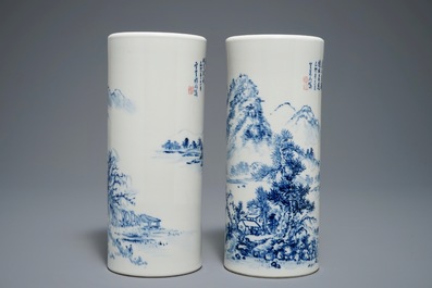 A pair of Chinese blue and white hat stands, 20th C.