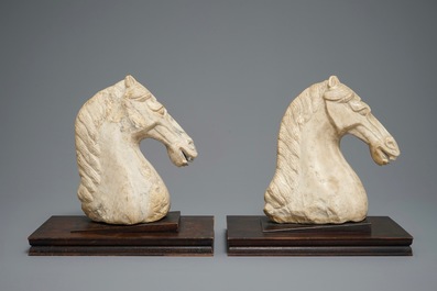 A pair of Chinese carved marble horse heads, poss. Tang