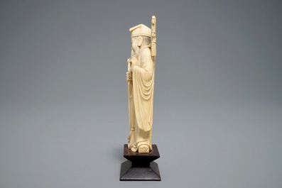 Two Chinese carved ivory figures of Shou Lao and Lu Dongbin, 19th C.