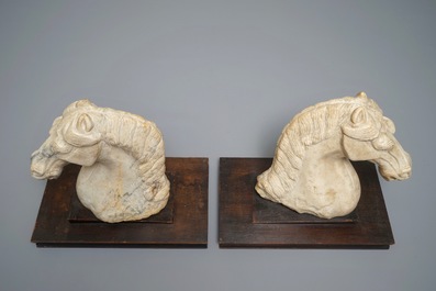 A pair of Chinese carved marble horse heads, poss. Tang