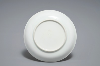 A Chinese famille verte teapot and milk jug, 19th C., and a famille rose cup and saucer, Qianlong