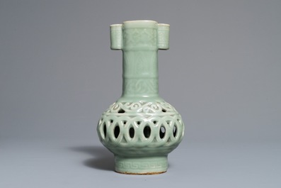 A Chinese celadon-glazed reticulated double-walled vase, 19/20th C.