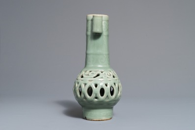 A Chinese celadon-glazed reticulated double-walled vase, 19/20th C.